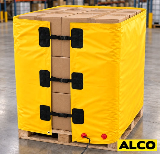 Industrial electric heating blanket laid over a pallet to maintain temperature of freight or materials in a warehouse setting.