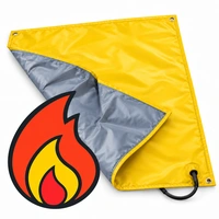 Yellow heated blanket with folded gray underside, power cord, and large flame icon